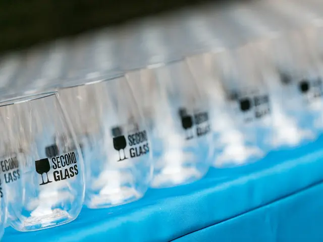 In the picture there are plenty of glasses kept on a blue surface and only few glasses were...